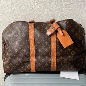 Vintage travel tote original authentic LV leather